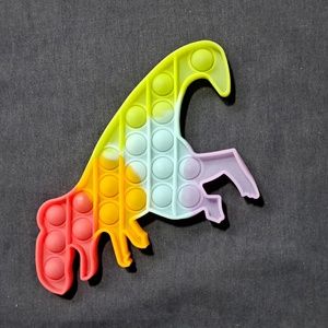 Rubber Rainbow Dino Pop Mat